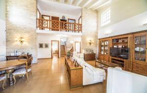 Posezení v ubytování Agradable Villa junto al mar con piscina