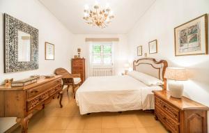 Postel nebo postele na pokoji v ubytování Agradable Villa junto al mar con piscina