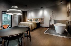 Voodi või voodid majutusasutuse Fjordgaarden - Spa - Hotel - Konference toas