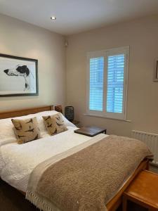 Un pat sau paturi într-o cameră la Adorable one bedroom apartment with balcony