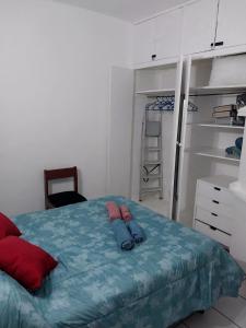 a bedroom with a bed and a bunk bed at Departamento Ciudad Mendoza in La Cieneguita