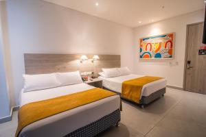 Postel nebo postele na pokoji v ubytování Hotel Zi One Luxury