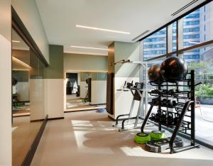 a fitness room with a rack of equipment in a building at citizenM Chicago Downtown in Chicago