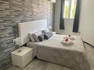 Postel nebo postele na pokoji v ubytování Villa Kathleen