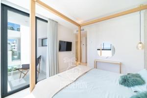 Posteľ alebo postele v izbe v ubytovaní HigueronRentals Casa Linda