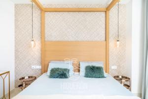Posteľ alebo postele v izbe v ubytovaní HigueronRentals Casa Linda