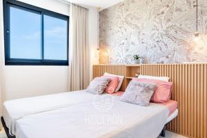Posteľ alebo postele v izbe v ubytovaní HigueronRentals Casa Linda