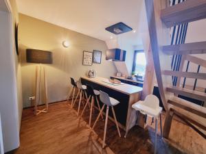 TV a/nebo společenská místnost v ubytování Ferienwohnung Rehblick Spreewaldferien-Burg