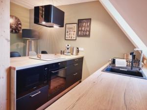 Kuchyň nebo kuchyňský kout v ubytování Ferienwohnung Rehblick Spreewaldferien-Burg