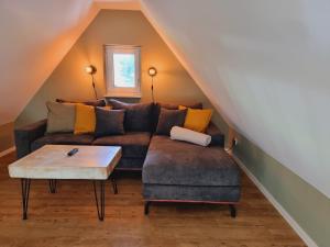 Posezení v ubytování Ferienwohnung Rehblick Spreewaldferien-Burg