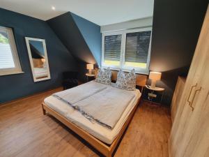 Postel nebo postele na pokoji v ubytování Ferienwohnung Rehblick Spreewaldferien-Burg