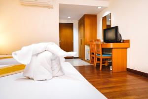 TV a/nebo společenská místnost v ubytování Neptuna Hotel