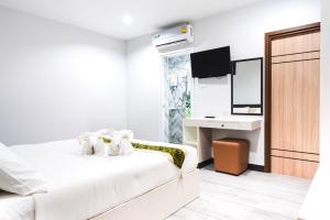 Postel nebo postele na pokoji v ubytování Neptuna Hotel