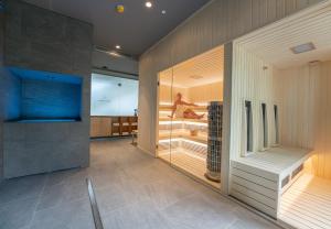 Voodi või voodid majutusasutuse Hotel HegiQ - Adults Only Hotel toas