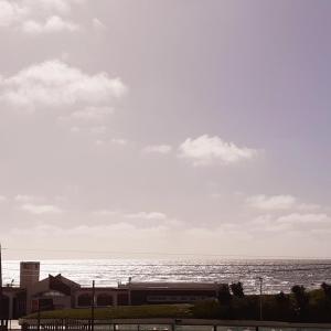 a view of the ocean on a cloudy day at Hotel Atlantic in Mar de Ajó +28 photos
