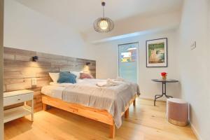 Posteľ alebo postele v izbe v ubytovaní Sun&Sport Apartamenty CEDROWY i ABIES parking i prywatna sauna w cenie