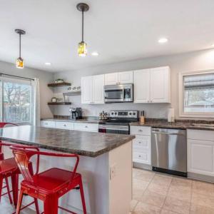 A kitchen or kitchenette at The Wendover - Entire Home near Lake Michigan!