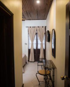 Кровать или кровати в номере Hotel Plaza Copan