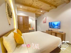 TV a/nebo společenská místnost v ubytování Riverside Mini Hotel Grand World Phu Quoc