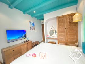 TV a/nebo společenská místnost v ubytování Riverside Mini Hotel Grand World Phu Quoc
