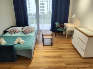 Fotografia z galérie ubytovania Uroczy apartament z miejscem na auto w garażu vo Varšave + 24 fotografií