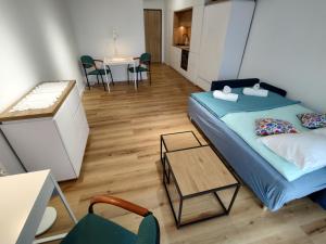 Fotografia z galérie ubytovania Uroczy apartament z miejscem na auto w garażu vo Varšave