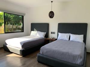 Postel nebo postele na pokoji v ubytování Mar De Estrellas - Hotel + 37 fotografií