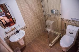 Koupelna v ubytování Ruanmata Homestay