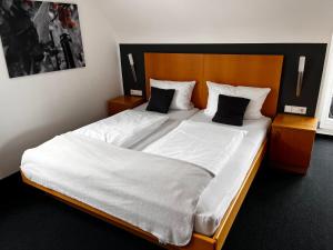 Postel nebo postele na pokoji v ubytování Landhaus Hohly