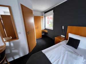 Postel nebo postele na pokoji v ubytování Landhaus Hohly