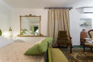 Posteľ alebo postele v izbe v ubytovaní Le Giuggiole 5 posti letto in una casa ricca d'atmosfera