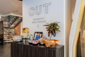 a counter in a store with food on it at Radisson Blu Elizabete Hotel, Riga in Riga