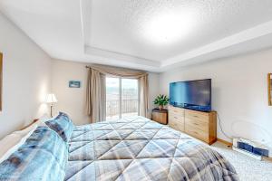 Ένα ή περισσότερα κρεβάτια σε δωμάτιο στο Cozy Fraser Cabin