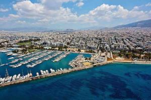 an aerial view of a harbor with boats at 150m² Live/Work Unique&Sunlit Space in Athens in Athens