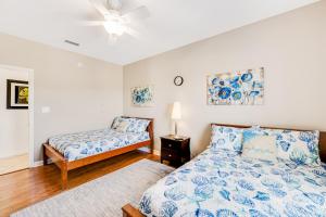 Postel nebo postele na pokoji v ubytování Relax by the Bay + 24 fotografií