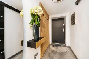 TV a/nebo společenská místnost v ubytování Golden Apartment by LoftAffair