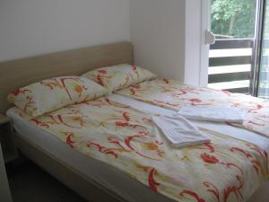 Postelja oz. postelje v sobi nastanitve Apartma Manfreda Bovec