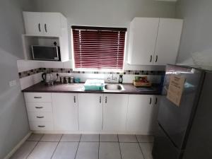 Η κουζίνα ή μικρή κουζίνα στο Aqua Farm Guesthouse