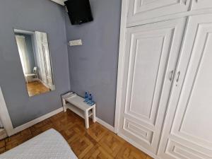 Postel nebo postele na pokoji v ubytování Hostal Fidalgo