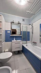 Ένα μπάνιο στο Selenza Apartament by Apartamenty na dni Wrocław +51 φωτογραφίες