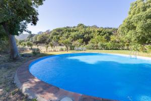 Der Swimmingpool an oder in der Nähe von Casa Granada