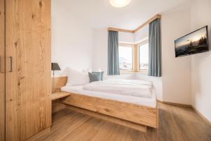 Postel nebo postele na pokoji v ubytování Zeit.Glück Appartements