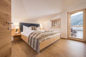 Postel nebo postele na pokoji v ubytování Zeit.Glück Appartements