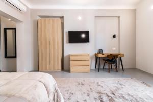 Postel nebo postele na pokoji v ubytování OPERA Hotel