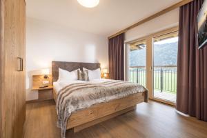 Postel nebo postele na pokoji v ubytování Zeit.Glück Appartements