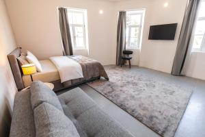 Postel nebo postele na pokoji v ubytování OPERA Hotel