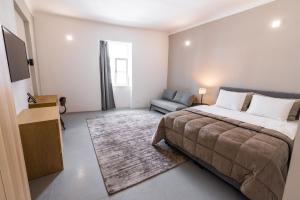 Postel nebo postele na pokoji v ubytování OPERA Hotel