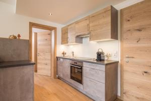 Kuchyň nebo kuchyňský kout v ubytování Zeit.Glück Appartements