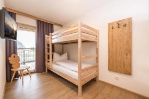 Postel nebo postele na pokoji v ubytování Zeit.Glück Appartements