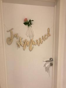 a door with a sign that says im married at Antwerp Business Suites in Antwerp